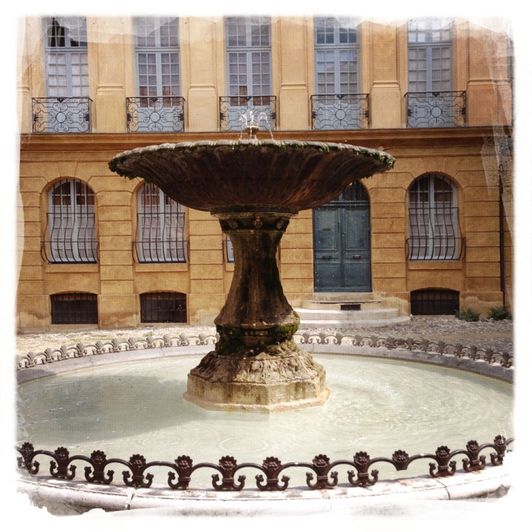 A cool fountain in one of the many courtyards of Aix.